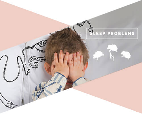 A little boy on a bed with his hands over his eyes and the text above him reads "sleep problems"